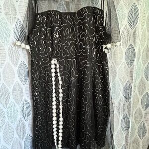 Chic Black Dress with White Bead Accents